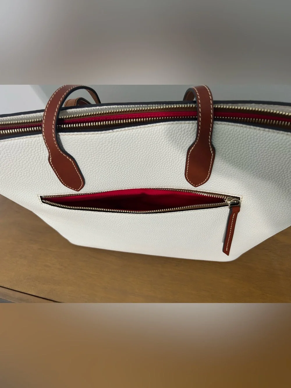 Dooney & Bourke White Pebbled Leather Tote with Brown Trim and Handles